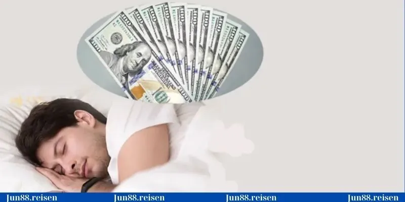 Ngủ mơ nhặt được tiền giấy là điềm báo may mắn